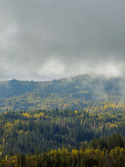 Misty Autumn Rain Clouds over Ukrainian Carpathian Mountains.
