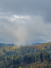 Misty Autumn Rain Clouds over Ukrainian Carpathian Mountains.