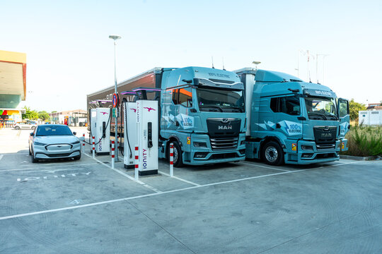 MAN electric truck at a high efficiency charging station showing clean battery power renewable energy and the future of sustainable zero emission transport mobility. Spain, Europe &ndash; August 7, 2025