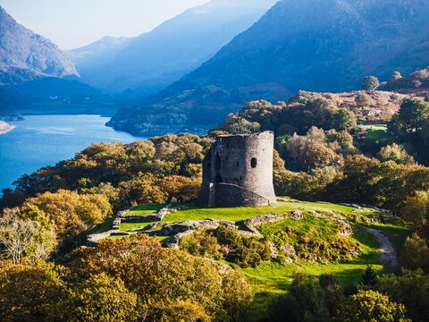 Autumn over Ruins of Dolbadarn Castle from a drone, Llanberis, Llywelyn, North Wales, UK
