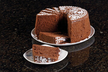 Chocolate chiffon cake, made with egg yolks, egg whites, oil, skim milk, baking powder, sugar, all-purpose flour, and cocoa powder.