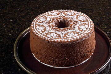 Chocolate chiffon cake, made with egg yolks, egg whites, oil, skim milk, baking powder, sugar, all-purpose flour, and cocoa powder.