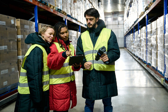 Warehouse team managing inventory in cold chain logistics