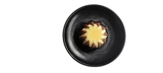 Chocolate Pudding with Creamy Vanilla Sauce  Custard on Black Plate Isolated on White Background. Food Stylish Photography