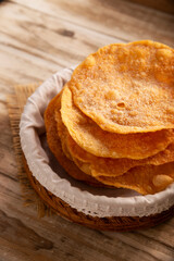 Buñuelos de rodilla. Traditional food at Christmas and winter holidays in Mexico, these are fried dough flour sprinkled with sugar or covered in a syrup made with piloncillo, cinnamon, and guava.