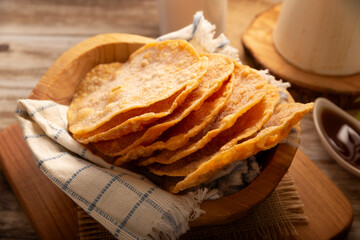 Buñuelos de rodilla. Traditional food at Christmas and winter holidays in Mexico, these are fried dough flour sprinkled with sugar or covered in a syrup made with piloncillo, cinnamon, and guava.