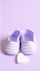 Adorable Lilac Gingham Baby Booties and White Heart. Minimalist Vertical Newborn Background for Announcements.