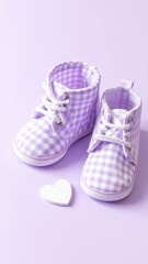 Cute Gingham Baby Booties in Pastel Lavender and White, Featuring a Small Heart on Purple Background.