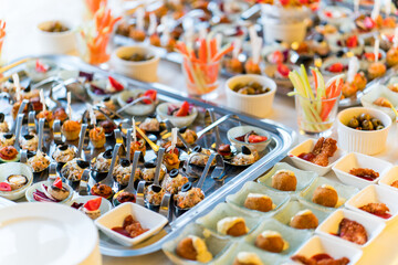 Beautifully decorated catering banquet table with different food
