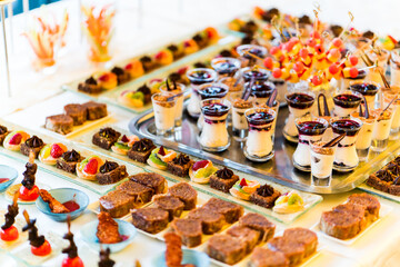 Beautifully decorated catering banquet table with different food