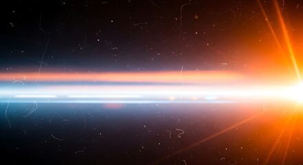 Abstract futuristic light streaks of blue and orange on a dark background with dust particles