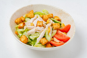 Fresh salad with grilled chicken, crunchy croutons, and vibrant veggies for a healthy meal