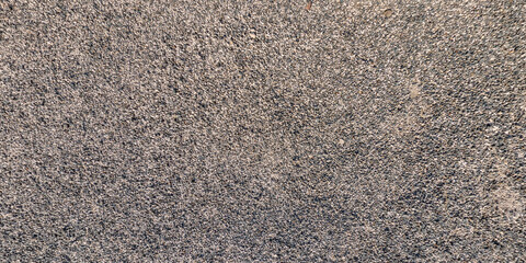 panorama view from above on surface of small pebbles and stones on sea coast