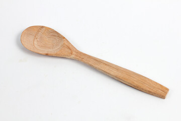 Rustic wooden spoon for culinary creations, adds a touch of warmth to any kitchen, perfect for food photography or blog designs, home cooking inspiration