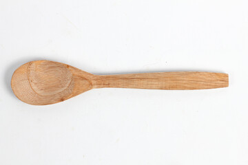 Rustic wooden spoon for culinary creations, adds a touch of warmth to any kitchen, perfect for food photography or blog designs, home cooking inspiration