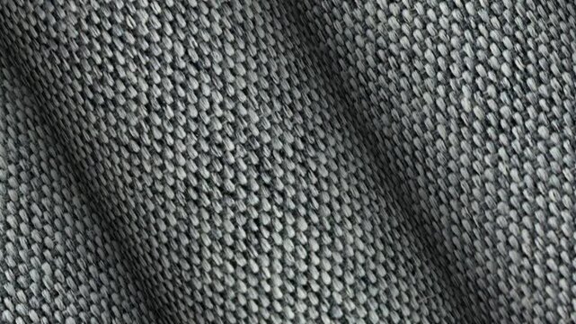 Gray blend rolls rotate showing microgrid woven texture shaped within an exclusive clean geometric abstract background