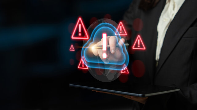 Red alert triangles over a blue cloud icon, symbolizing cloud security threats, system warnings, and data protection risks in digital environments Parse