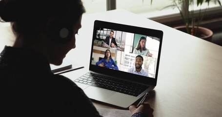 Diverse people take part in video call displayed on laptop - Powered by Adobe
