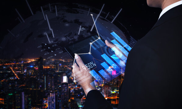 Businessman reviews financial data on a tablet, showcasing digital graphs and charts against a vibrant city skyline, symbolizing modern business analytics. Scalp - Powered by Adobe