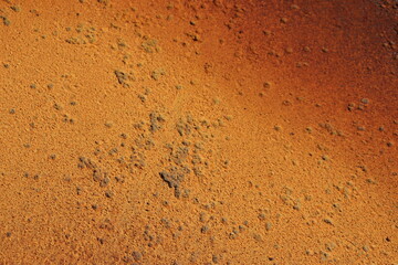 Rusty metal background in brown, red and orange colors. Rusty métal with particles and texture....