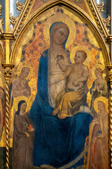 Obraz premium Painting (15th century) of Blessed Virgin Mary holding baby Jesus Christ in her arms.