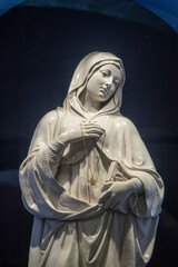 Stone statue (19th century) of Blessed Virgin Mary.