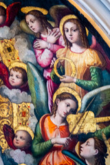 Fototapeta premium Painting (19th century) of a group of musician angels playing music.