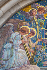 Obraz premium Mosaic (19th century) of a group of musician angels in the sky playing music.