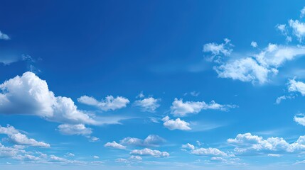 Vibrant Blue Sky with Fluffy White Cumulus Clouds Daytime Weather Scenery