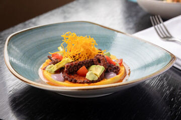 traditional Peruvian food, octopus anticuchero