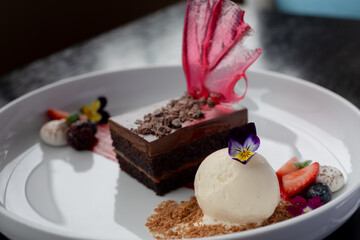 chocolate cake with ice cream and meringue