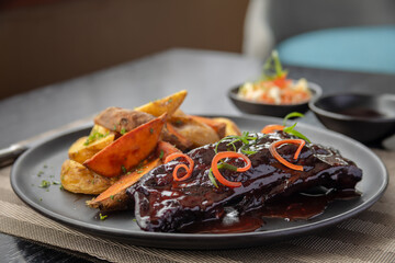 traditional Peruvian food, pork ribs with purple corn juice