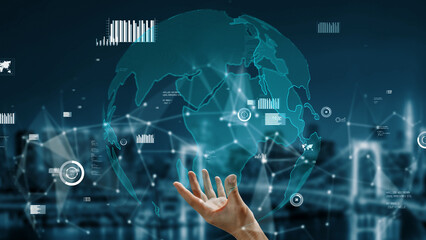 A futuristic hand reaches towards a digital globe displaying data visualizations and network connections, symbolizing innovation and global connectivity in technology. Xenic