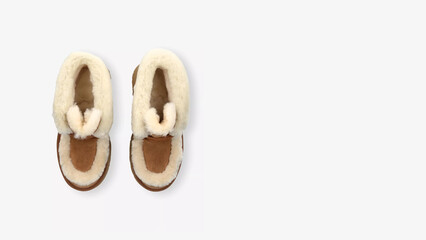 Cozy slippers made of soft material perfect for home relaxation on a chilly evening.