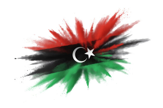 Libya flag in powder explosion with vibrant red green and black colors symbolizing national pride and celebration on transparent - Powered by Adobe