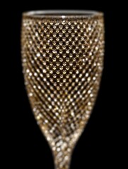 Rhinestone covered champagne flute with diamond mesh pattern on dark background, editorial holiday assets for luxury branding and creative marketing