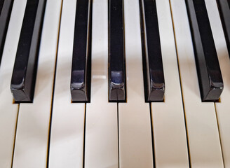 Naklejka premium piano keys close up