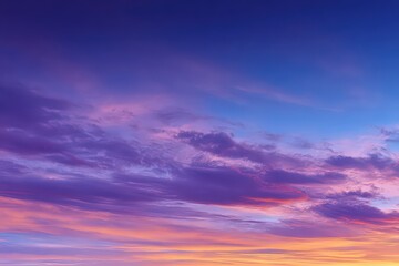 Obraz premium Dramatic Sunset Sky with Violet Clouds and Orange Hues Illuminating the Horizon