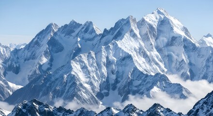 Naklejka premium Snowy mountain peaks with cloud inversion on a sunny day