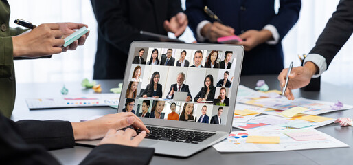Analyst team use sticky note for creative and analytic brainstorm for business idea with BI data dashboard on laptop screen. Analysis financial data visualization tech for marketing strategy. Prodigy
