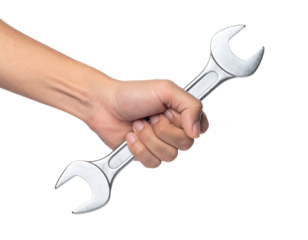 Empowering hand firmly holding a wrench, ready to tackle any repair or construction project with precision and strength