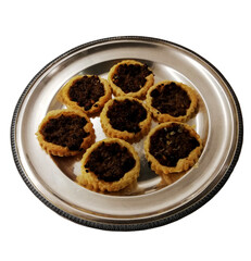 Tartlets with meat on a silver tray, isolated
