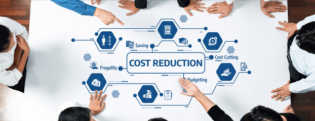 A dynamic business meeting focused on cost reduction strategies, showcasing diverse professionals engaging in collaborative discussions around budgeting and efficiency in a modern office. Amity