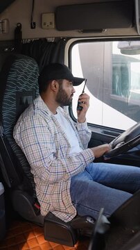 Truck driver communicating using a handheld cb radio