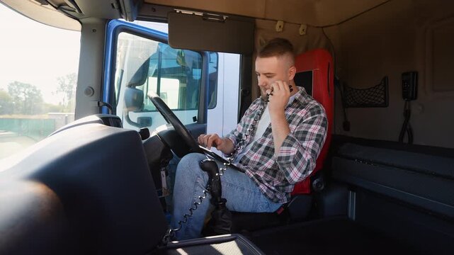 Truck driver communicating on cb radio inside right hand drive car