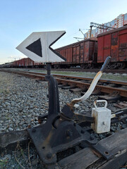 Old mechanism for translating railway tracks. Arrow for switching railway