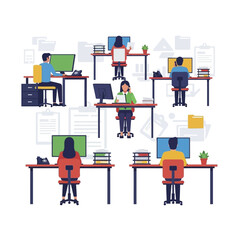 People working in an office setting, focused on their computers.