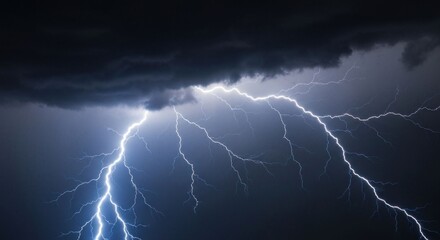 Fototapeta premium Dark, stormy sky illuminated by brilliant, jagged lightning bolts