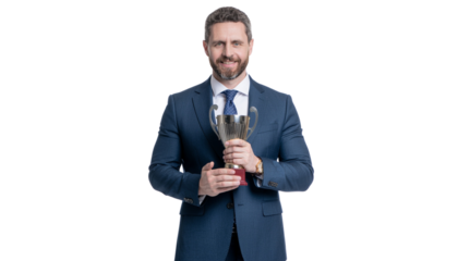 Smiling corporate winner holding a gold trophy, a symbol of business achievement and professional victory, isolated subject png cutout