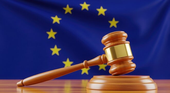 Gavel of justice against the european union flag, symbolizing eu law and governance.